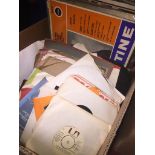 A box of 45s and LPs Catalogue only, live bidding available via our website. If you require P&P