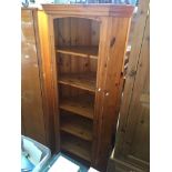 A pine corner cabinet Catalogue only, live bidding available via our website. If you require P&P