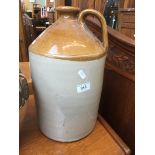 A large stoneware flagon Catalogue only, live bidding available via our website. If you require P&