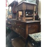 An oak dressing table with swing mirror, turned legs and brass tear drop handles Catalogue only,