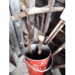 A fire bucket, large hand screws and a hand axe Catalogue only, live bidding available via our