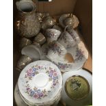 A box of china teaware Catalogue only, live bidding available via our website. If you require P&P