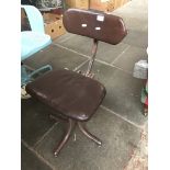 An industrial style metal and brown leather office chair Catalogue only, live bidding available