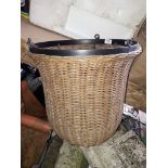 A metal and wicker hanging basket Catalogue only, live bidding available via our website. If you