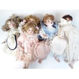 A box of collectors dolls and stands Catalogue only, live bidding available via our website. If