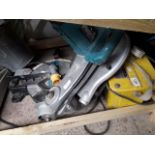 A transformer and a Makita chop saw Catalogue only, live bidding available via our website. If you