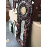 A large reproduction continental style mirror clock Catalogue only, live bidding available via our