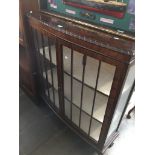 An Edwardian display cabinet. Catalogue only, live bidding available via our website. If you require