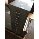 A grey metal multi drawer filing cabinet Catalogue only, live bidding available via our website.