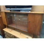Teak cabinet with glass sliding doors Catalogue only, live bidding available via our website. If you