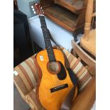 An acoustic guitar Catalogue only, live bidding available via our website. If you require P&P please