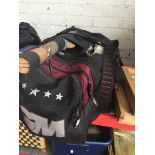 A GM cricket bag full of cricket equipment Catalogue only, live bidding available via our website.