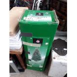 An artificial xmas tree Catalogue only, live bidding available via our website. If you require P&P