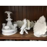 Four white shelves and ornaments Catalogue only, live bidding available via our website. If you