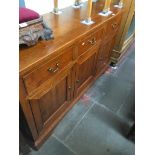 A modern oak sideboard by Willis & Gambier. Catalogue only, live bidding available via our