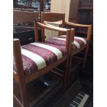 A pair of teak armchairs Catalogue only, live bidding available via our website. If you require P&
