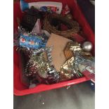 A large red crate of mainly Christmas related items Catalogue only, live bidding available via our