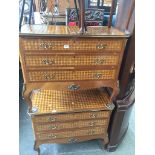 A pair of French Louis XVI style parquetry inlaid chests of drawers with brass mounts. 20th