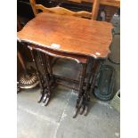 An Edwardian mahogany nest of tables. Catalogue only, live bidding available via our website. If you