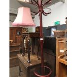 A bentwood coat stand Catalogue only, live bidding available via our website. If you require P&P