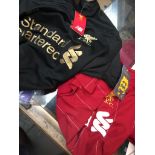 Two LFC football shirts and a signed Jurgen Klopp photo Catalogue only, live bidding available via