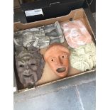Box with terracotta masks etc. Catalogue only, live bidding available via our website. If you
