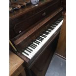 A Sames oak cased upright piano Catalogue only, live bidding available via our website. If you