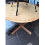 A circular light wood kicthen table Catalogue only, live bidding available via our website. If you