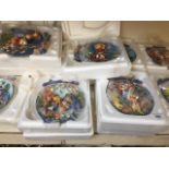 A collection of 10 Winnie the Pooh collectors relief plates by Bradford Exchange Catalogue only,