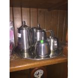 A five piece Oneida Continental stainless steel tea set Catalogue only, live bidding available via