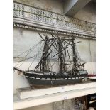 A 19th century wooden model galleon, length 94cm. Catalogue only, live bidding available via our