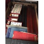 A box containing MahJong game etc Catalogue only, live bidding available via our website. If you