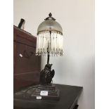 A reproduction art deco style owl figure table lamp with glass shade Catalogue only, live bidding
