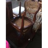 A pair of continetal bergere chairs and a pair of folding metal patio chairs Catalogue only, live