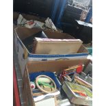 A box of bric a brac, a box of board games and a box of cloths Catalogue only, live bidding