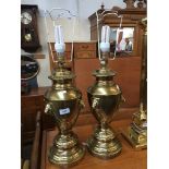 A pair of brass reproduction table lamps. Catalogue only, live bidding available via our website. If
