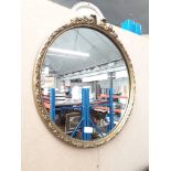 A gilt edged circular mirror Catalogue only, live bidding available via our website. If you