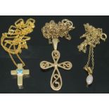 A group of three pendants on chains, various 9ct gold marks, gross wt. 6.43g.