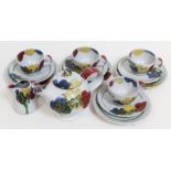 Janice Tchalenko "Poppy" for Dartington Pottery, a fourteen piece tea service comprising teapot,