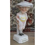 An advertisement plaster figure formed as a golfer 'He played a Penfold', height 47cm. From the