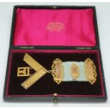 A hallmarked 15ct gold Masonic medal, gross wt. 24.74g (including ribbon), with original case.