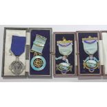 A group of four hallmarked silver Masonic type medals, three boxed.