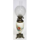 A brass mounted and hand painted glass oil lamp with etched glass shade, height 69cm.