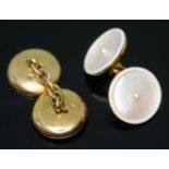 A pair of mother of pearl and cultured pearl set cufflinks, marked '18', gross wt. 8.01g, with