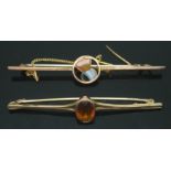 Two hallmarked 9ct gold brooches, one set with a citrine and the other a thistle design, gross wt.