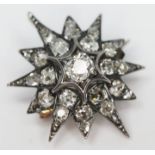 A diamond cluster pendant/brooch, total approx. diamond wt. 1.75 carats, length 29mm, gross wt. 4.