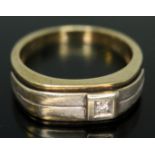 A gent's two colour diamond ring, 9ct gold import marks, gross wt. 6.25g, size U.