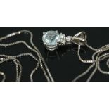 An Italian diamond and aquamarine pendant, the round brilliant cut aquamarine diam. approx. 6mm