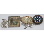 A group of five brooches comprising a hallmarked silver and cloisonne target brooch 'Made For