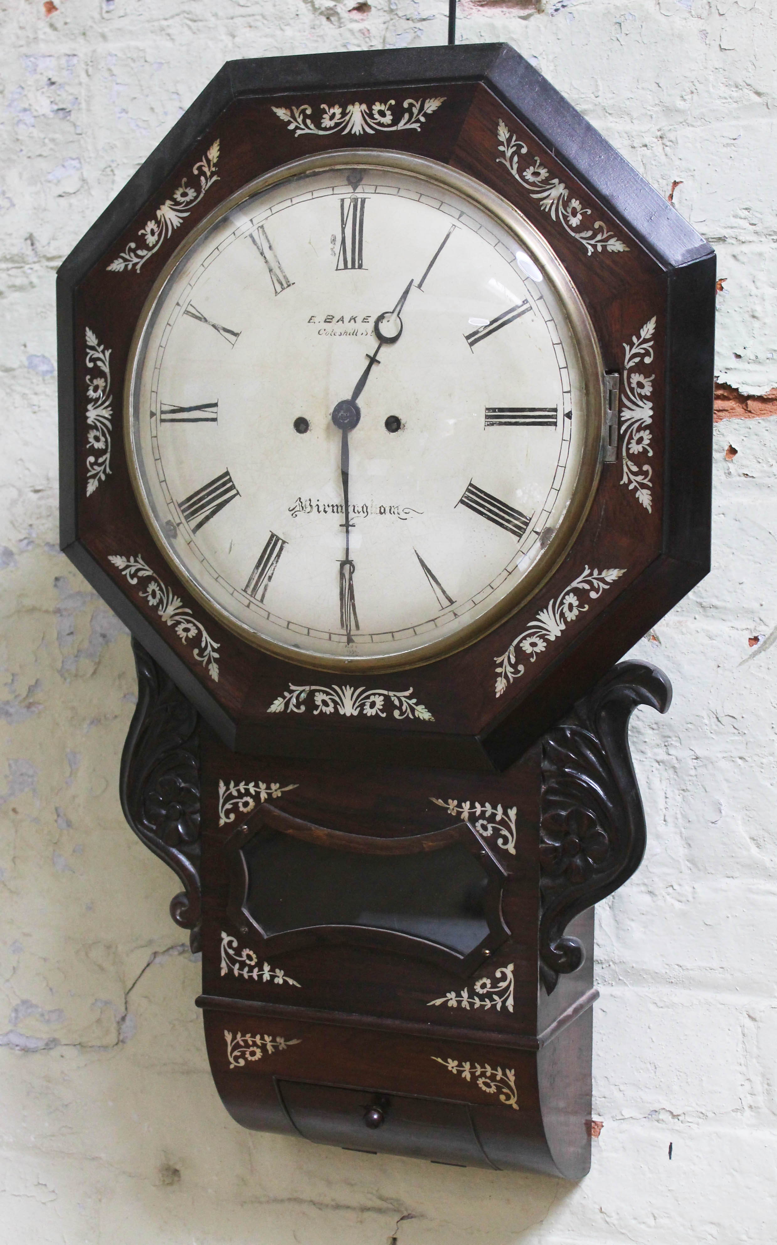 A mother of pearl inlaid rosewood double fusee drop dial wall clock, the 30cm dial signed 'E Baker